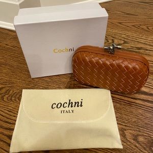 Cochni Italy hand clutch Camel Woven Leather